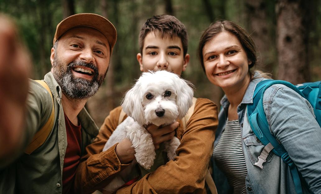 Family taking a photo while hiking