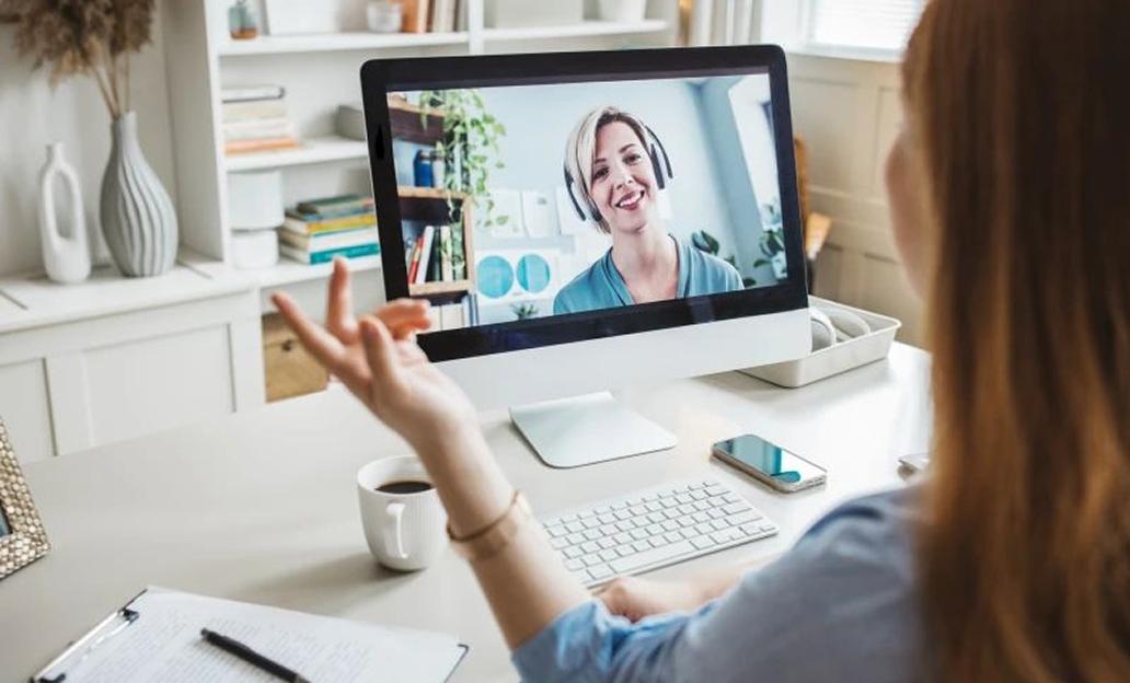 Woman talking to another woman on a virtual call